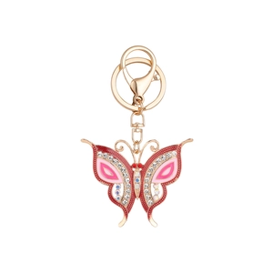 Colorful butterfly keychain with red and pink enamel and rhinestones on gold metal base