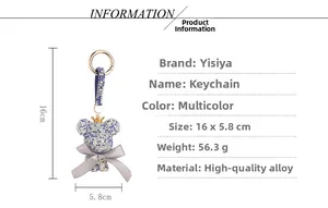 Detail view of rhinestone teddy bear keychain with dimensions 16cm by 5.8cm and 56.3g weight