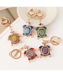 Détails de porte-clés tortue en cristal avec émail coloré et strass scintillants