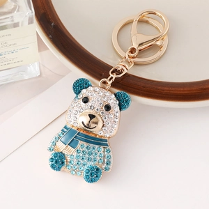 Porte-clés ours en cristal scintillant avec strass bleus et mousqueton doré élégant