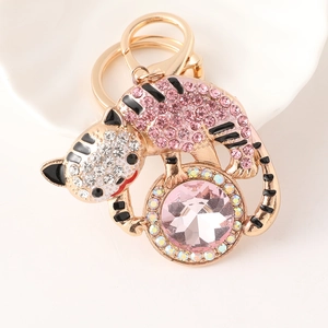 Porte-clés léopard étincelant avec cristaux roses et fermoir doré en métal brillant