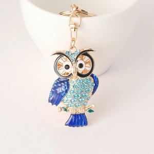 Creative zinc alloy owl keychain with blue rhinestones and gold-plated finish