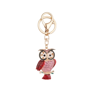 Cartoon owl keychain with pink crystals and red enamel on a gold-plated zinc alloy base