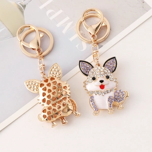 Sparkling puppy keychain with crystal rhinestones and golden heart cutout back detail