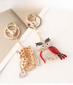 Détails du porte-clés chouette avec strass étincelants et émail coloré sur alliage doré