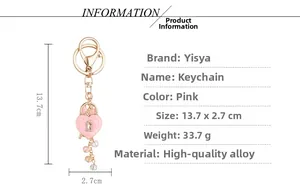 Detailed view of pink heart lock keychain with size dimensions 13.7 x 2.7 cm