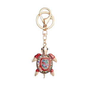 Porte-clés tortue de mer étincelant avec strass colorés et finition en métal doré