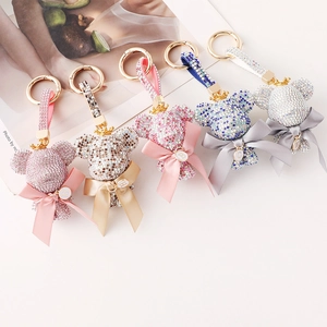 Sparkling crystal bear keychain with custom letters and stylish crown in five vibrant colors