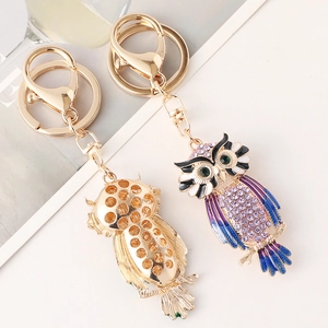 Colorful crystal owl keychain with purple rhinestones and gold-plated metal finish