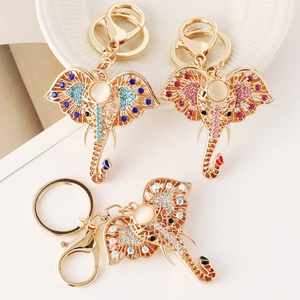 Golden elephant keychain with colorful rhinestones and cat-eye stone set of three