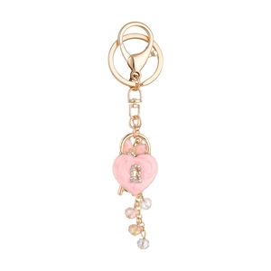 Elegant gold heart lock keychain with pink enamel and sparkling crystal beads on white