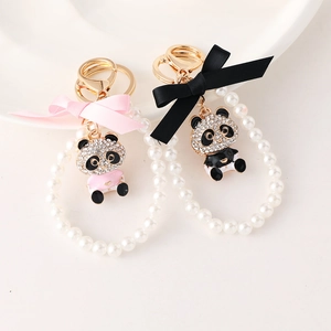 Cartoon panda pearl keychain with crystal charms and satin bow for bags and keys