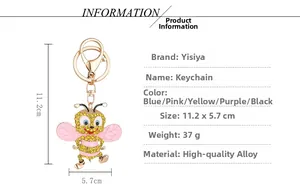 Detailed view of rhinestone bee keychain showing gold alloy finish and 11.2x5.7cm dimensions