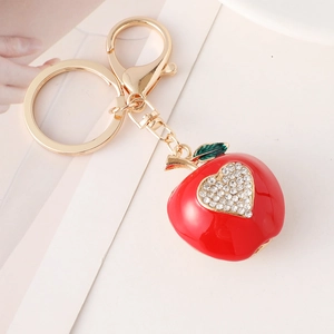 Porte-clés pomme rouge scintillant avec strass en cœur et fermoir doré élégant