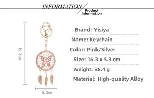 Detail view of rose gold dreamcatcher keychain with pink butterfly and metal feathers