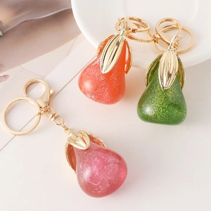 Porte-clés Créatif Forme Poire Résine à Paillettes Avec Feuille en Métal Doré Bijou de Sac Mode Femme Cadeau