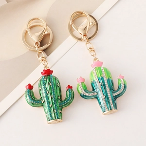 Sparkling cactus keychains with green rhinestones and golden lobster clasps for handbags
