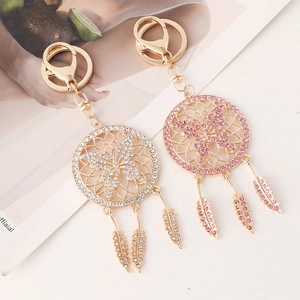 Elegant dreamcatcher butterfly keychain with rhinestones and gold feathers for bags
