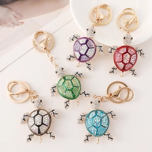 Sparkly turtle keychains in five colors with rhinestones and gold alloy hardware