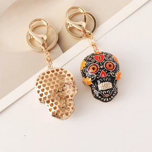 Mandala skull enamel keychain with Day of the Dead floral patterns and heart grid back