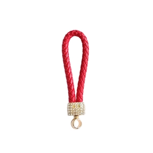 Red braided leather keychain with sparkling gold rhinestone-encrusted metal ring and hook