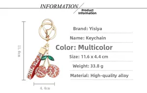 Detailed dimensions and specs of a sparkling rhinestone cherry keychain in gold alloy