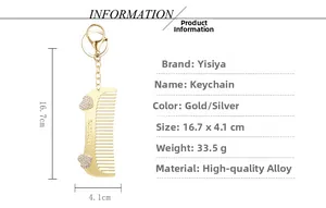 Detail of golden comb keychain with My Love engraving and diamond heart patterns