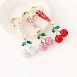 Porte-clés cerise 3D créatif avec strass étincelants et cordon en cuir pour sacs à main