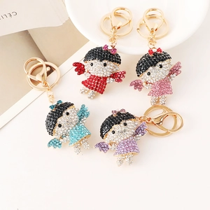 Porte-clés ange de dessin animé en quatre couleurs avec strass brillants et anneau doré