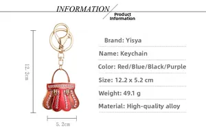Detail view of crystal handbag keychain showing dimensions and premium metal finish