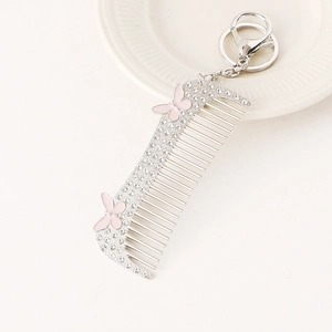 Sparkling rhinestone alloy comb keychain with pink butterfly charms and silver lobster clasp