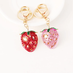 Cute strawberry metal keychains with shiny rhinestones in red and pink colors