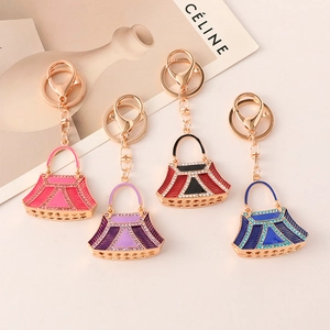 Elegant rhinestone handbag keychains in multiple colors with polished gold-tone alloy