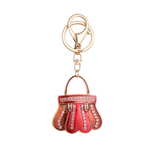 Exquisite red enamel handbag keychain with gold alloy frame and sparkling pink crystals