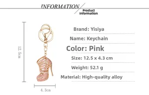 Macro detail of a golden high heel keychain with pink rhinestones and dimensions