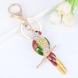 Porte-clés perroquet exquis avec cristaux colorés et base en alliage de zinc doré