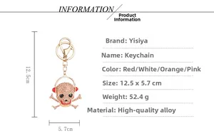 Detailed view of skull keychain with rhinestones and headphones including dimensions