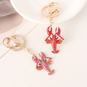 Creative lobster keychains in red and pink enamel with crystal rhinestones on gold ring