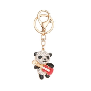 Cute panda keychain with red guitar and sparkling crystals on golden metal ring