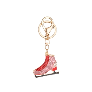 Exquisite red ice skate keychain with pink rhinestones and gold-plated metal hardware