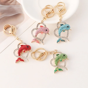 Sparkling dolphin heart keychains with colorful rhinestones in pink blue red and green