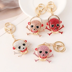 Hip-hop skull headphone keychain with crystals in silver, gold, red, and pink colors