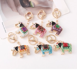 Detail of multi-colored elephant keychains with crystal rhinestones and enamel patterns
