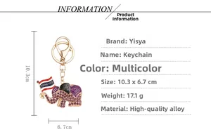 Detail of Thai elephant keychain with purple rhinestones and golden lobster clasp