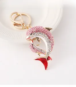 Porte-clés dauphin avec strass roses et cadre en métal doré de haute qualité