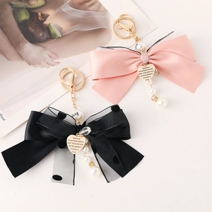 Elegant mesh bow keychain with pearls and heart pendant for women handbag accessory