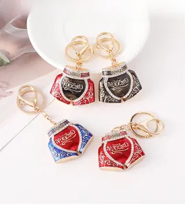 Detailed view of Muay Thai shorts keychains with alloy casting and sparkling rhinestones