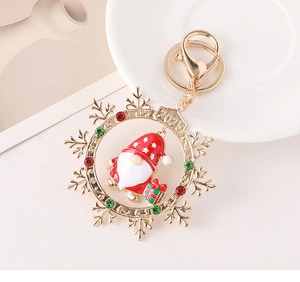 Detail of 2025 snowflake keychain with gnome charm and sparkling colorful rhinestones