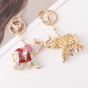 Enamel elephant keychain with colorful rhinestones and hollow heart metal design