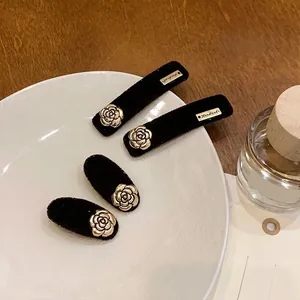 Brown velvet camellia hair clips with golden roses for women in elegant 4-piece set